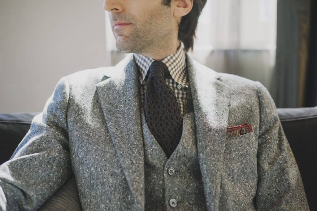 man in tweed suit